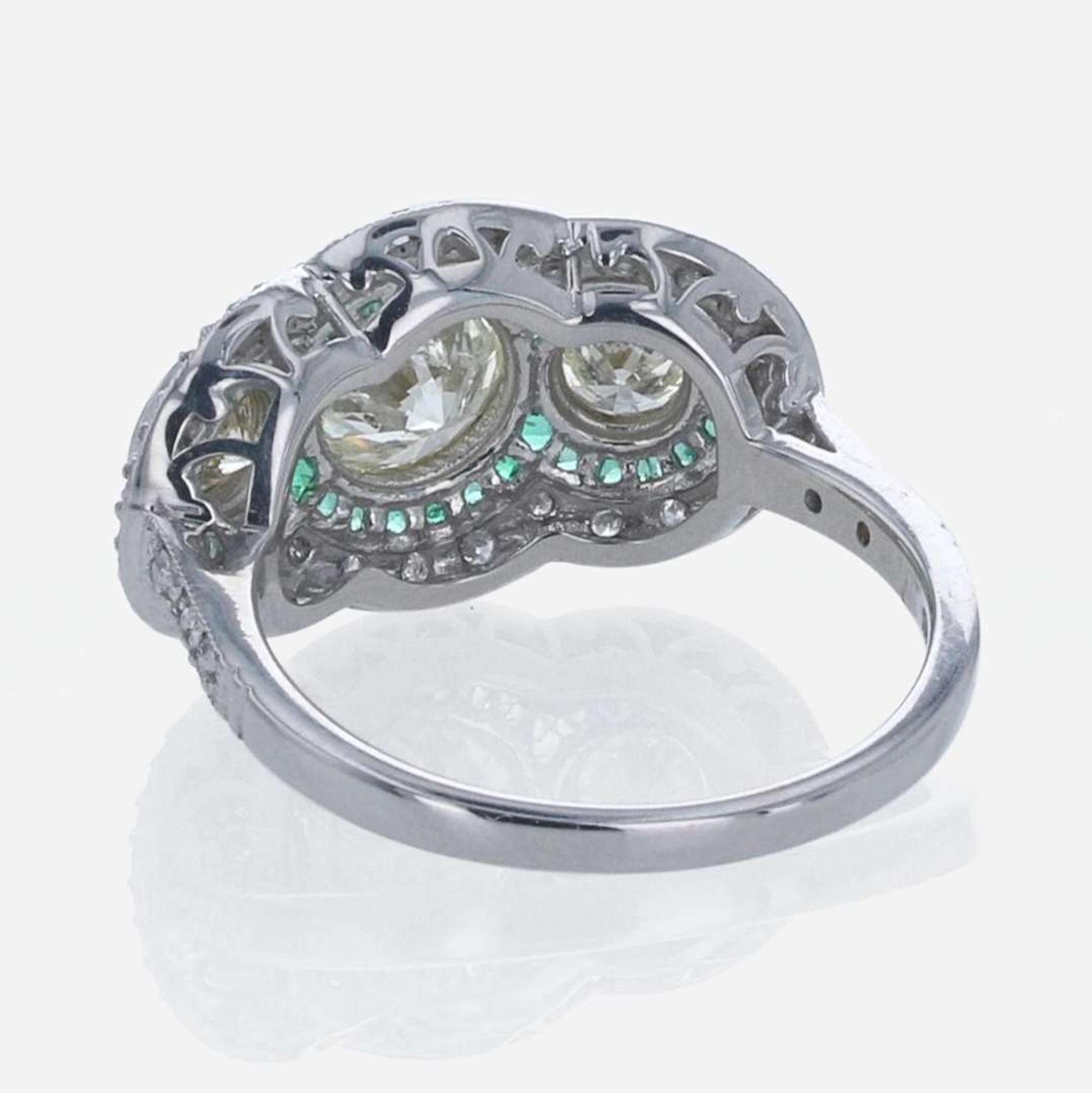 A Diamond, Emerald, and 18K White Gold Ring