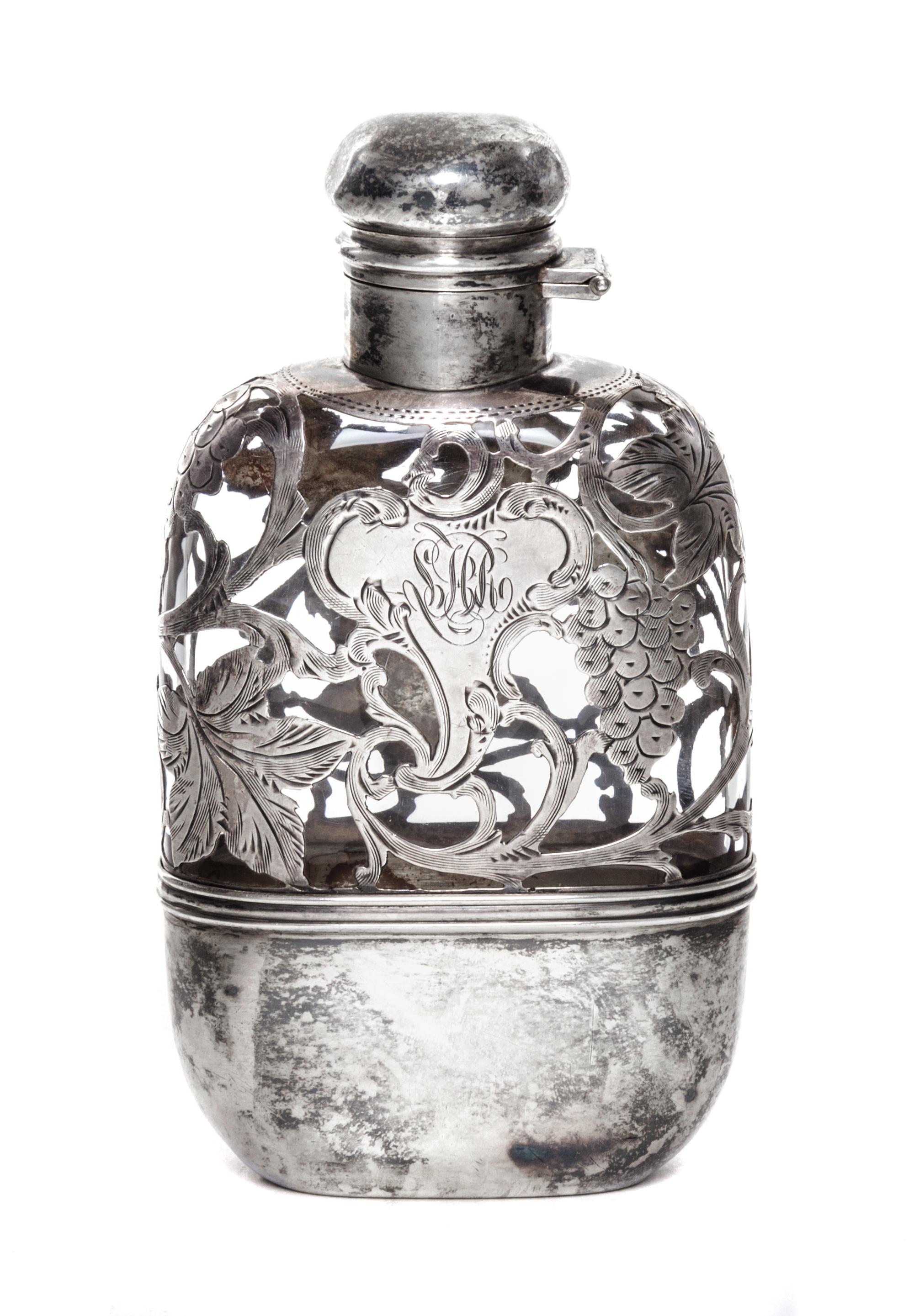 An American Silver Overlay Glass Flask, Alvin Manufacturing Corp., Providence, RI, Early 20th Century, of flattened form with hinged tw