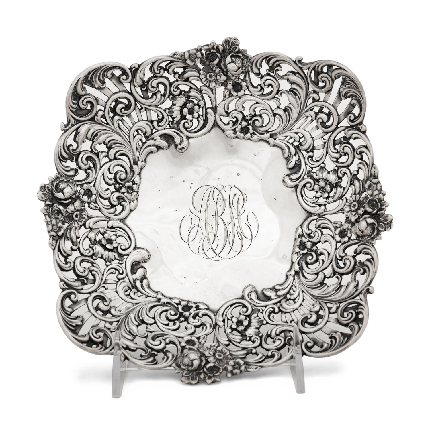 An American Silver Reticulated Bowl Raised on Ball Feet