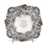 An American Silver Reticulated Bowl Raised on Ball Feet