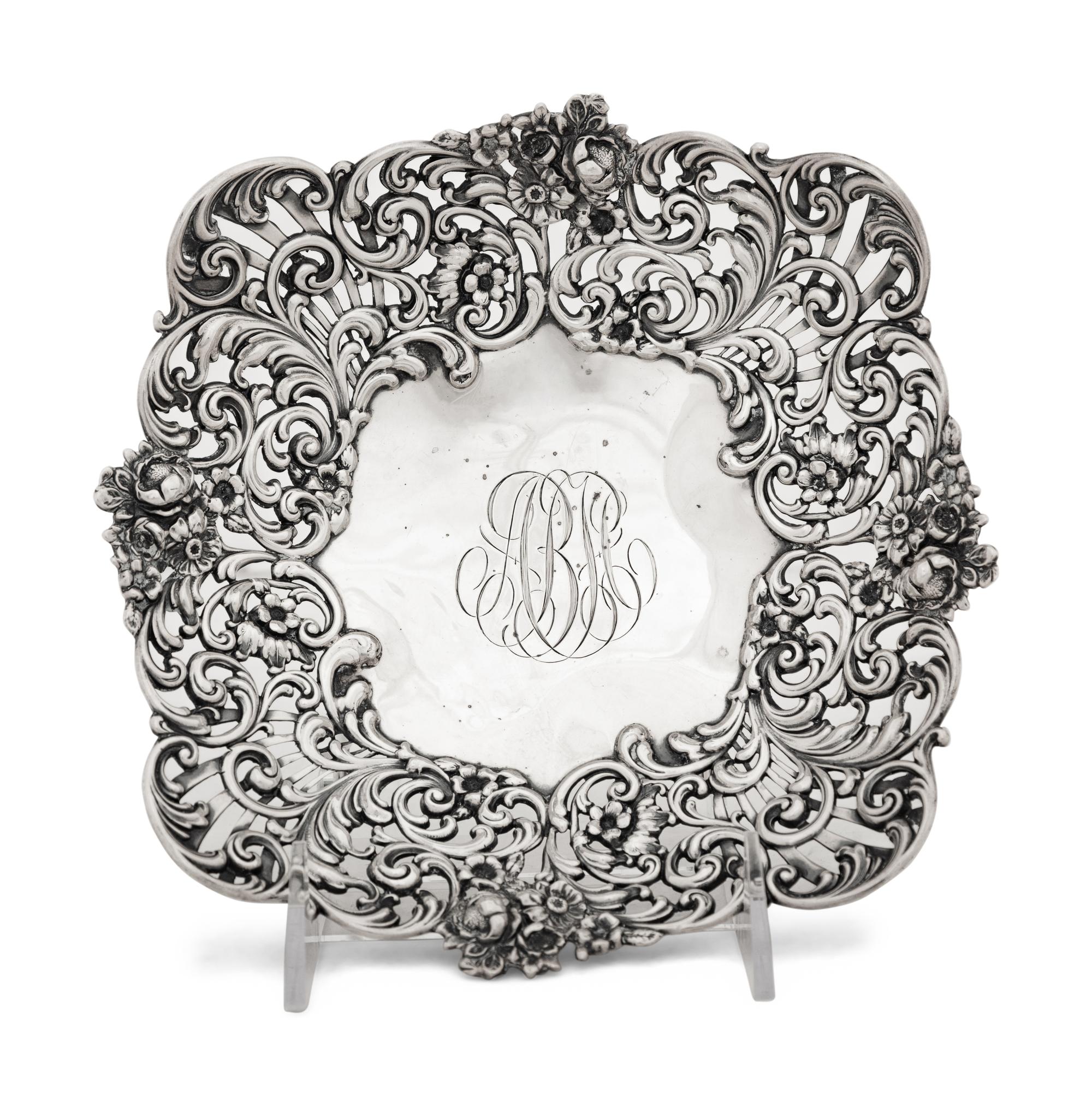 An American Silver Reticulated Bowl Raised on Ball Feet