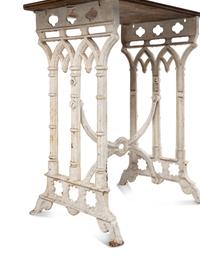 A Continental Gothic Style Painted Cast Iron Marble-Top Garden Table