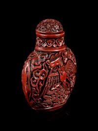 A Carved Red Lacquer Snuff Bottle