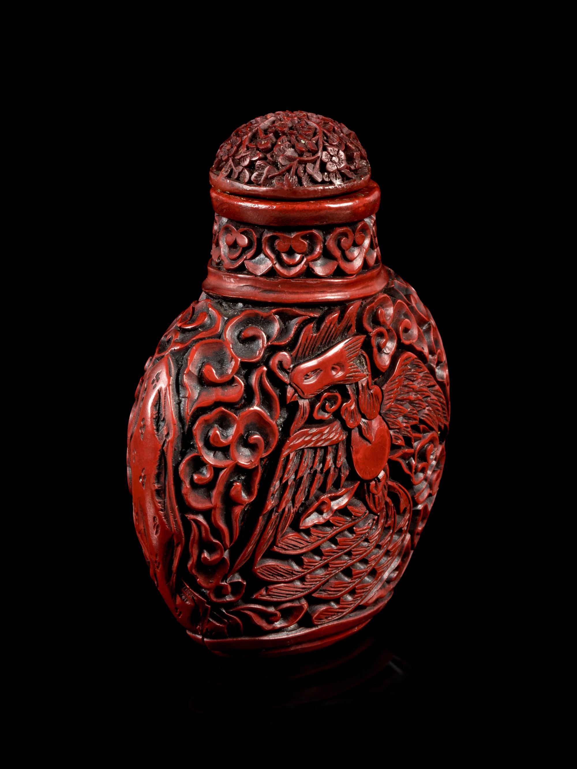 A Carved Red Lacquer Snuff Bottle