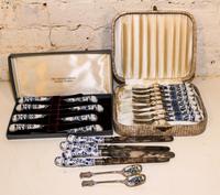 A Collection of Sheffield Silver-Plate Blue Onion Porcelain Mounted Flatware Articles Length of dinner knife 10 1/4 inches.