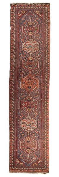 A Persian Wool Runner 12 feet 8 inches x 2 feet 11 1/4 inches.