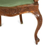 A Pair of Anglo-Colonial Tamarind Wood Armchairs