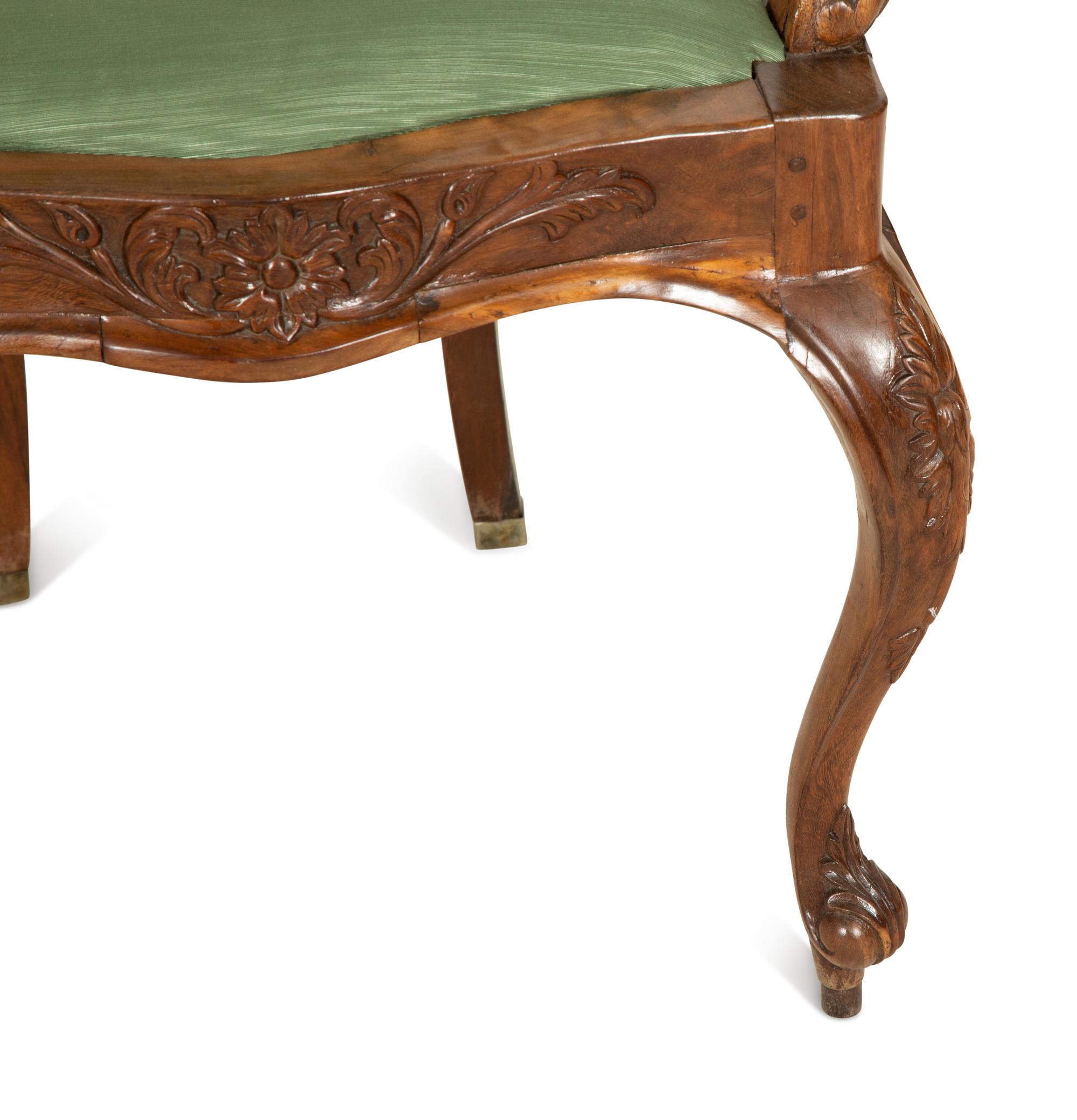 A Pair of Anglo-Colonial Tamarind Wood Armchairs