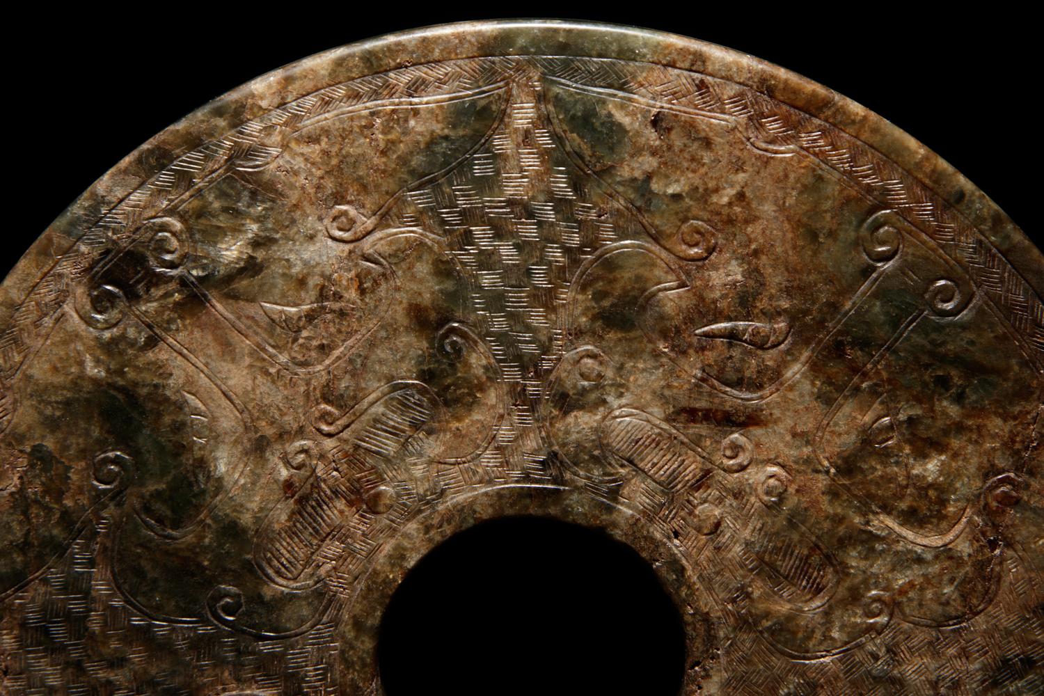 A Chinese Carved Nephrite Jade Bi Disc