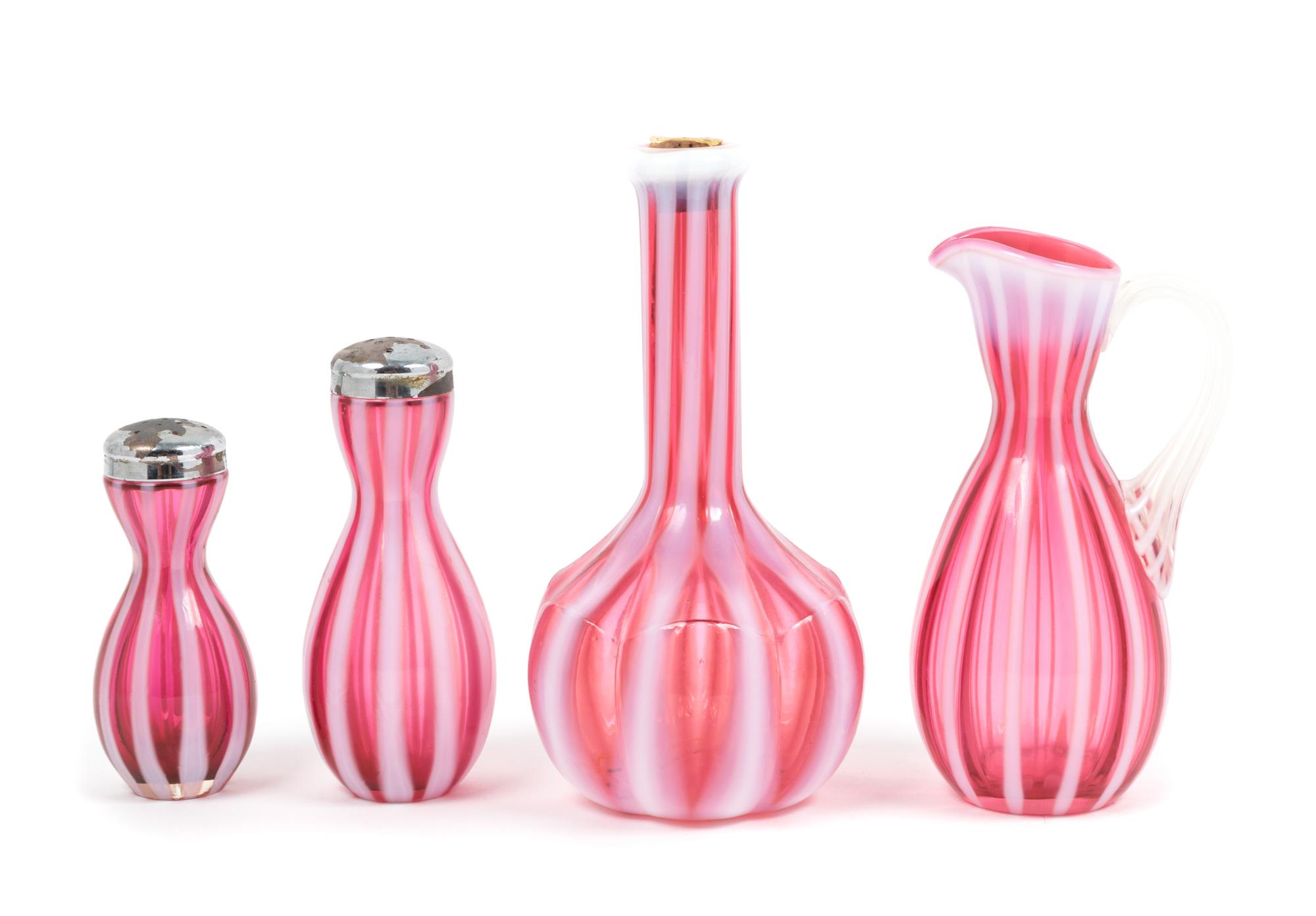Four Cranberry Rib Optic Articles Height of tallest 7 1/2 inches.