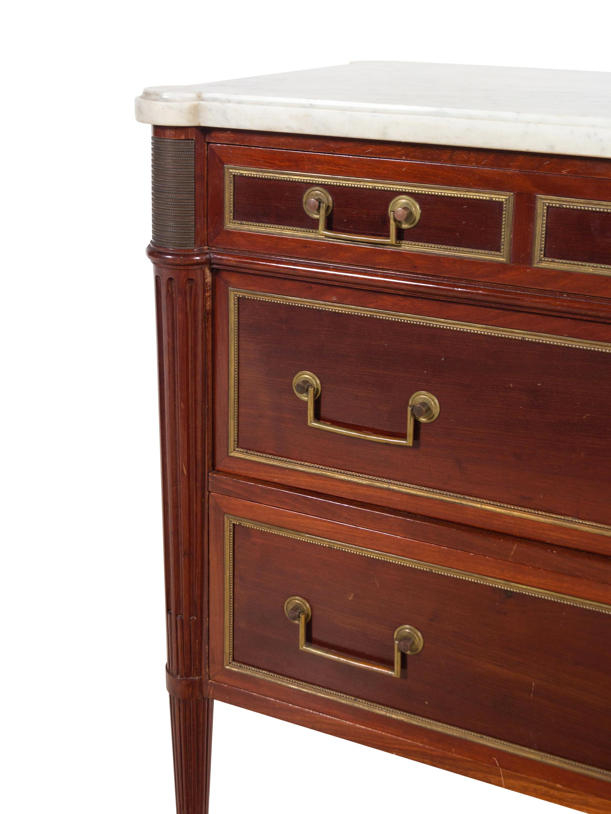 A Directoire Style Bronze Mounted Mahogany Marble-Top Commode