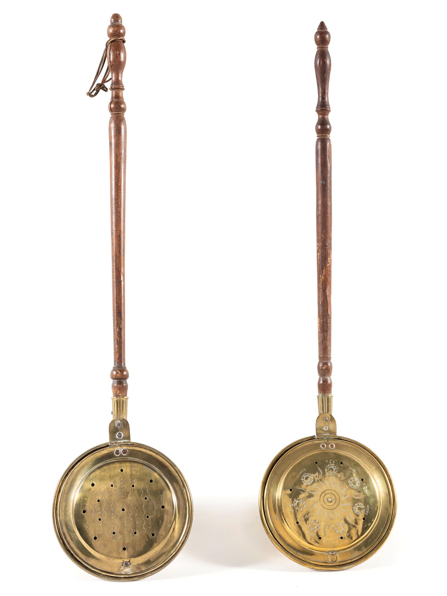 Two Engraved Brass and Wood Bed Warmers