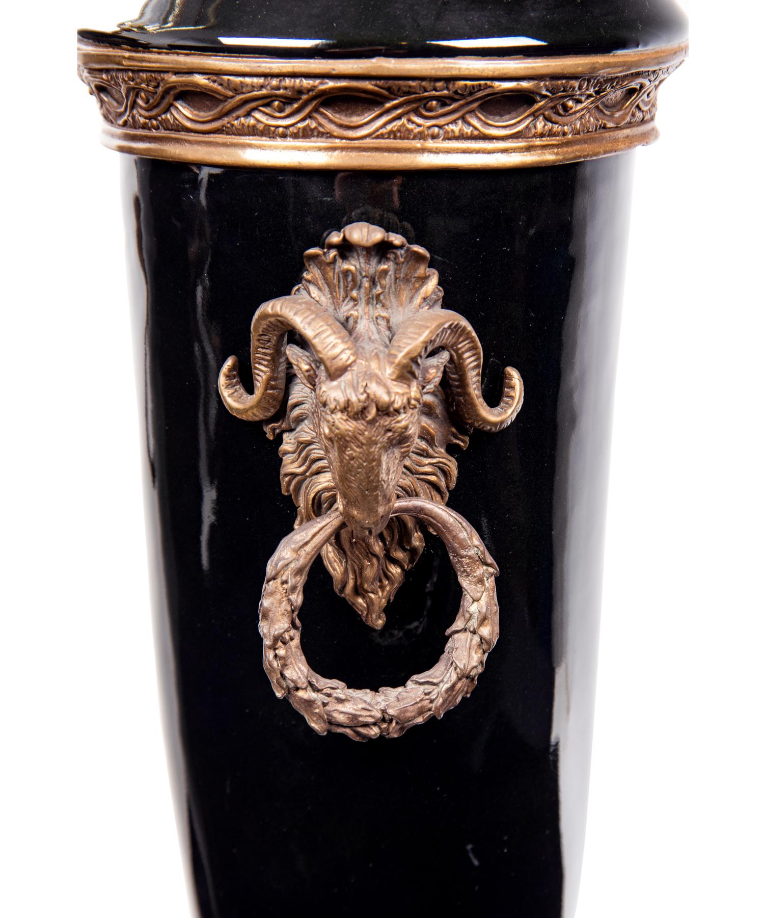 A Pair of French Gilt Bronze and Glazed Ceramic Urns Mounted as Lamps