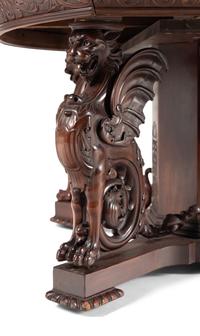 A Renaissance Revival Carved Mahogany Dining Table and Set of Six Chairs