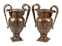 A Pair of Neo-Egyptian Style Patinated Bronze Urns