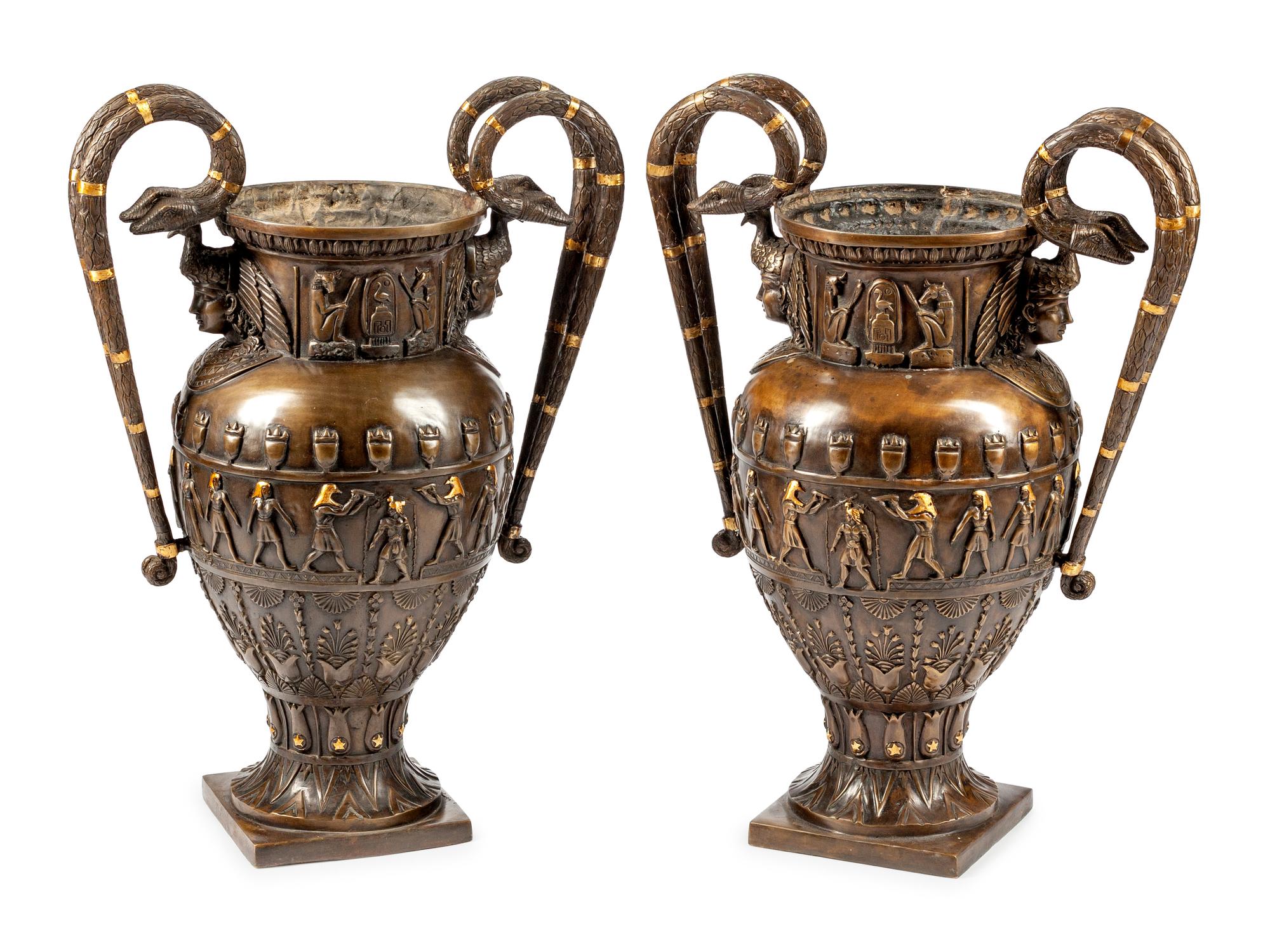 A Pair of Neo-Egyptian Style Patinated Bronze Urns