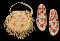 Sioux quilled hide pocketbook and pair of quilled moccasins first half 20th century