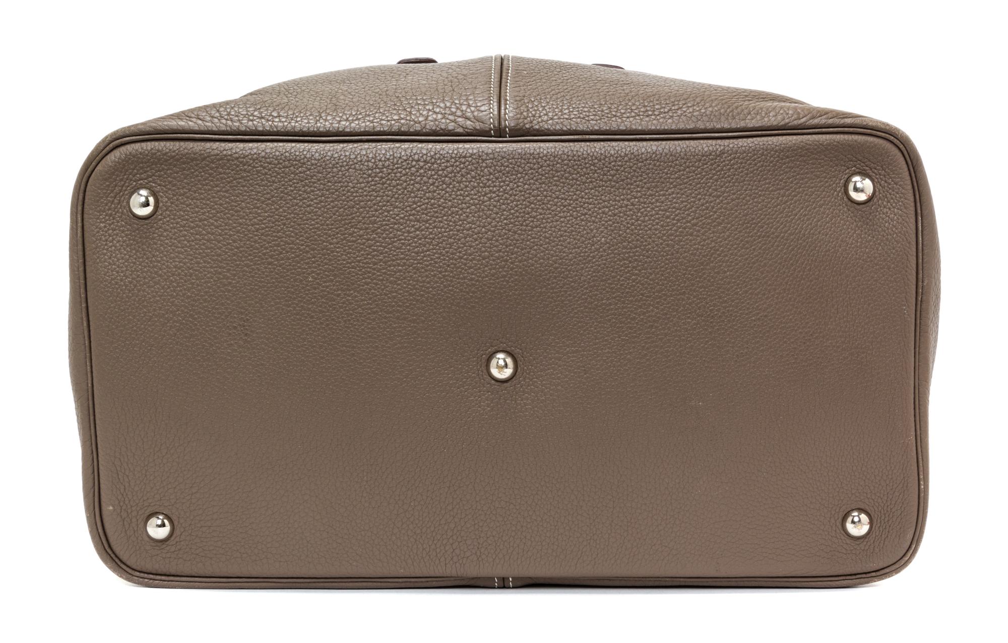 An Hermes Etoupe Leather Thar Travel Bag. 21.5" x 18" x 10".