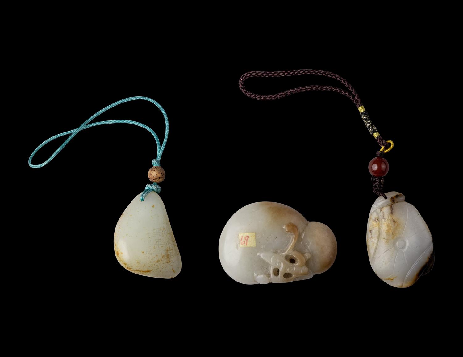 Three Chinese White Jade Carvings, 18th-19th Century 清中期 白玉把件三枚