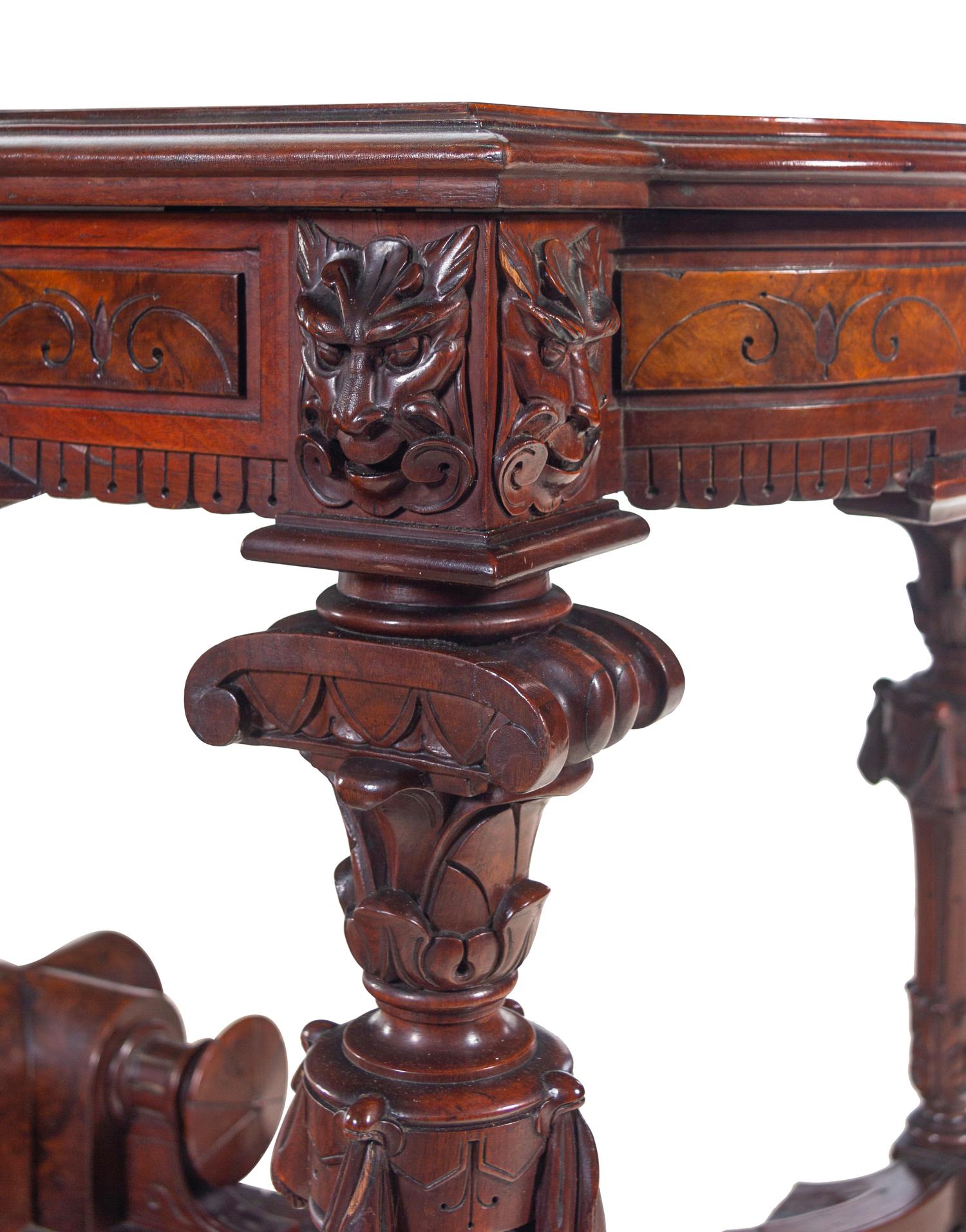 A Victorian Carved, Inlaid and Painted Walnut Writing Desk