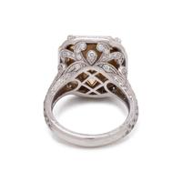 AN IMPRESSIVE FANCY YELLOW DIAMOND AND DIAMOND RING