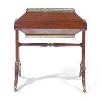 A Neoclassical Pierced Brass Mounted Mahogany Cellarette