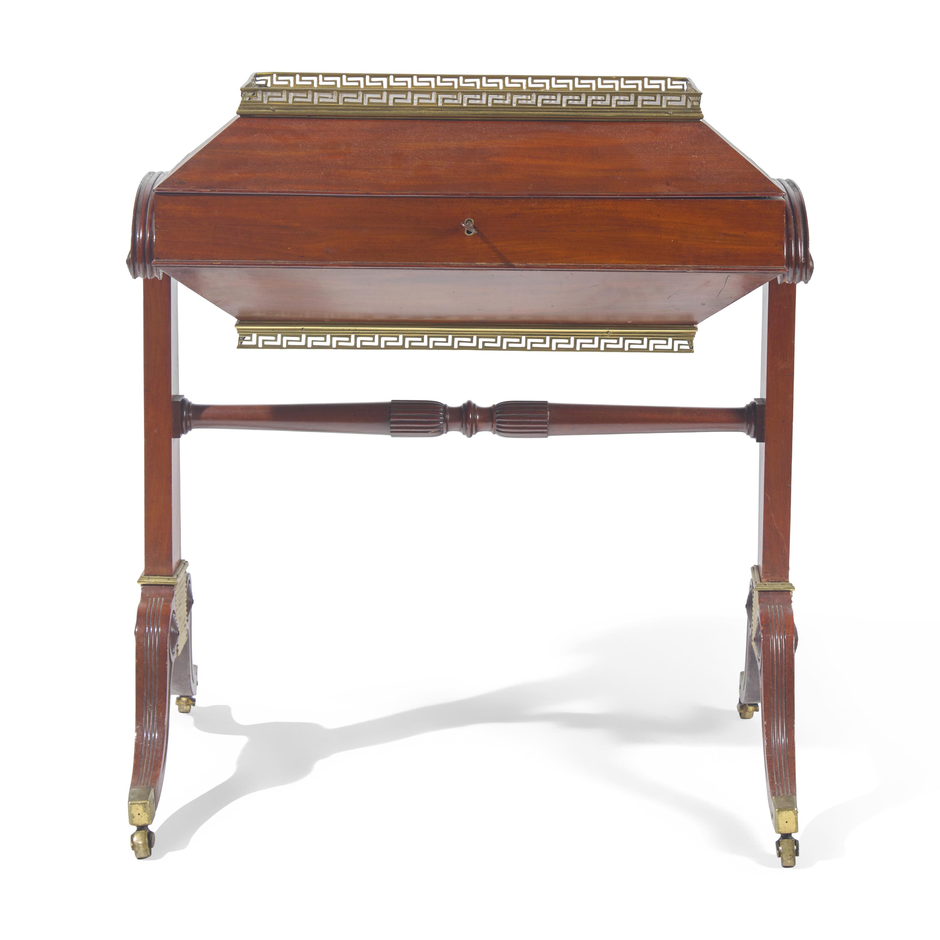 A Neoclassical Pierced Brass Mounted Mahogany Cellarette