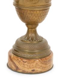 A Pair of Continental Gilt Bronze and Onyx Urns