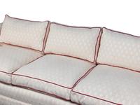 An Upholstered Three-Seat Sofa