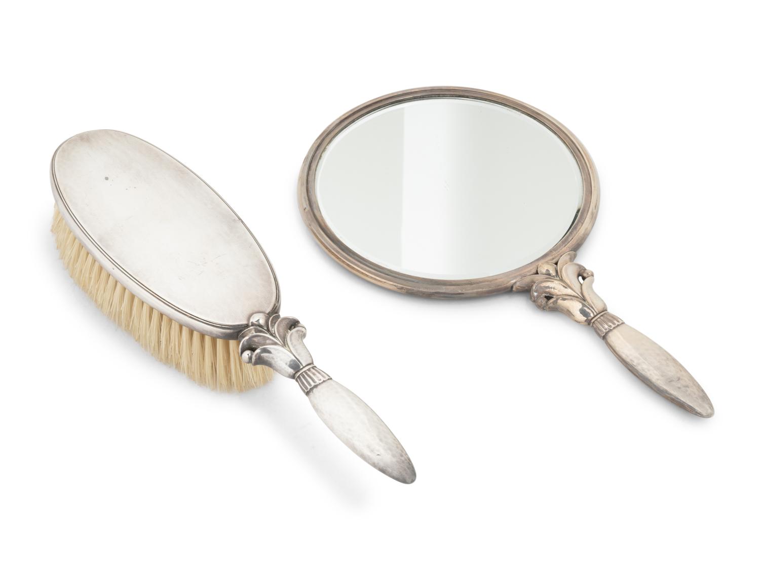 A Georg Jensen Acanthus Two-Piece Silver Dresser Set