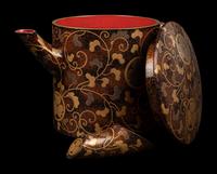 A Japanese Gold Decorated Brown and Red Lacquer Tableware Set