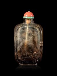 A Carved Smoky Quartz Snuff Bottle