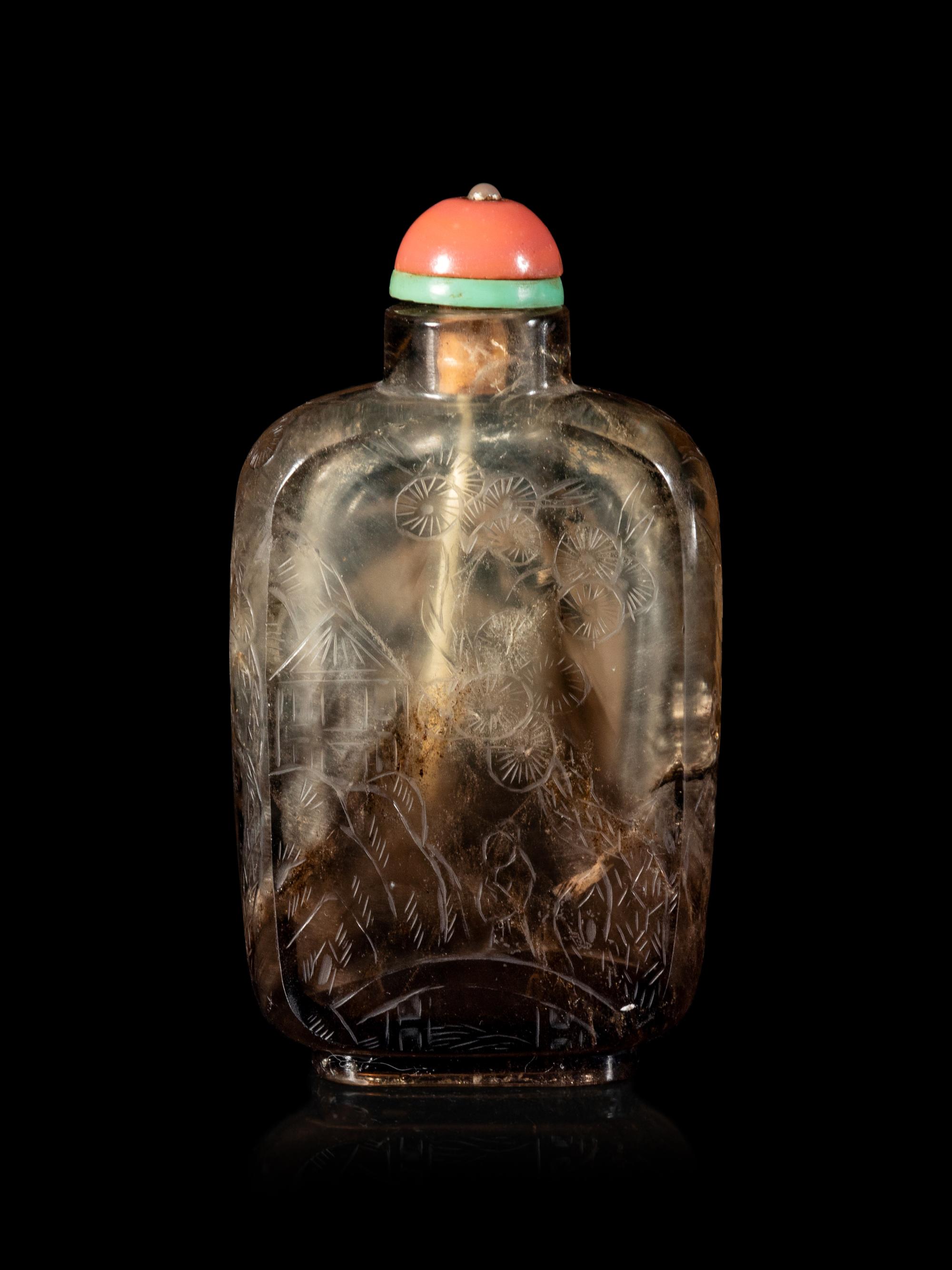 A Carved Smoky Quartz Snuff Bottle