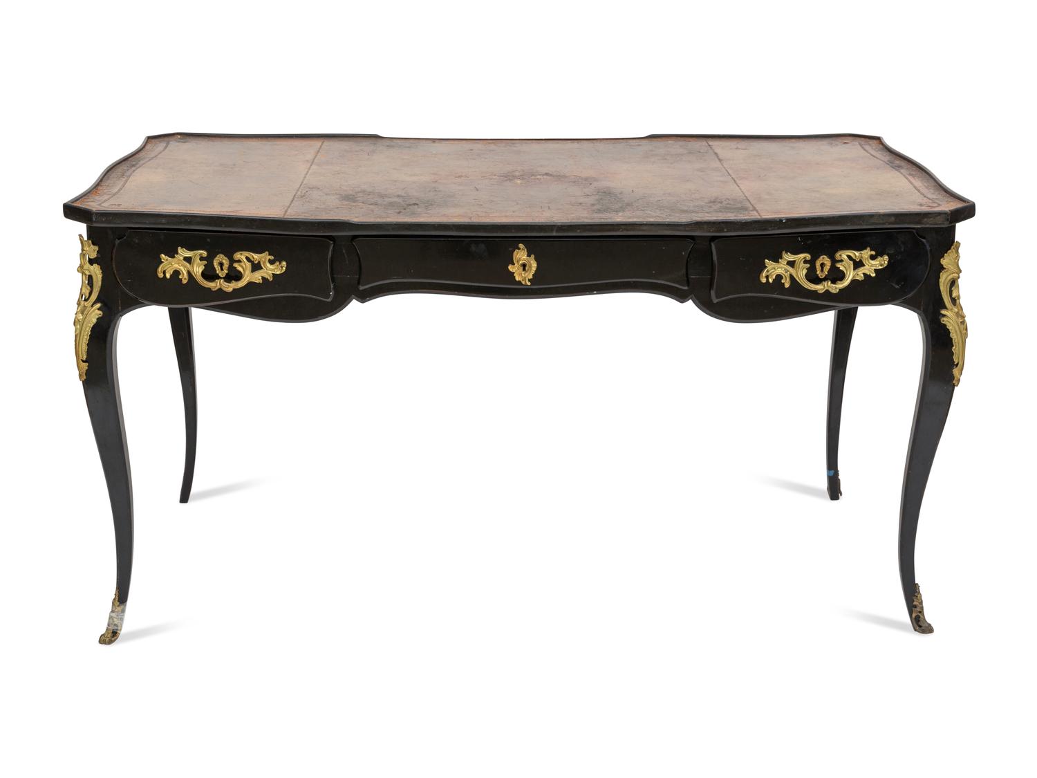 A Louis XV Style Gilt Bronze Mounted Ebonized Bureau Plat
