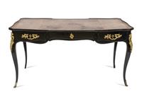 A Louis XV Style Gilt Bronze Mounted Ebonized Bureau Plat