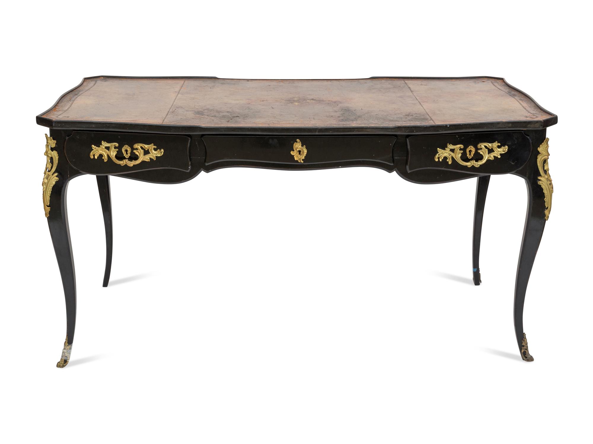 A Louis XV Style Gilt Bronze Mounted Ebonized Bureau Plat