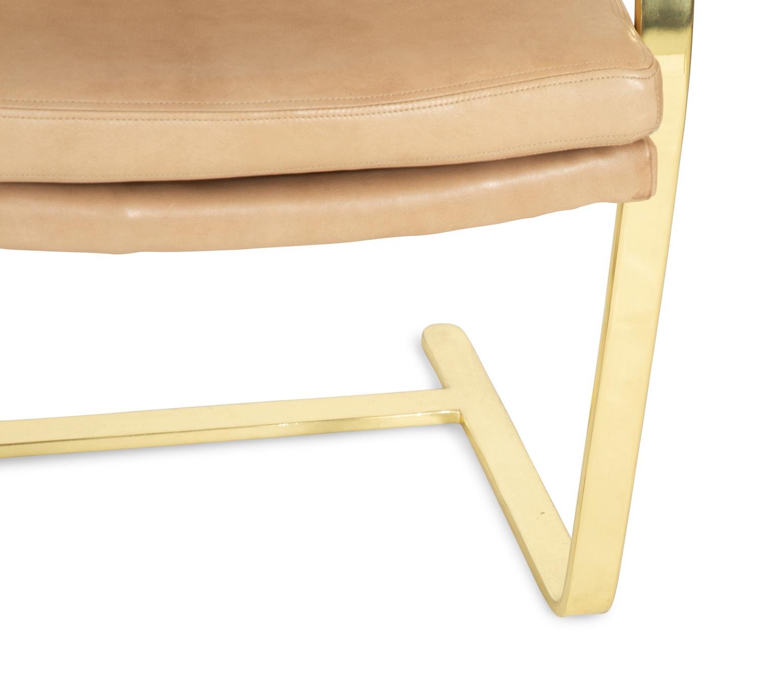 A Set of Twelve Gilt Steel Dining Chairs with Leather Upholstery
