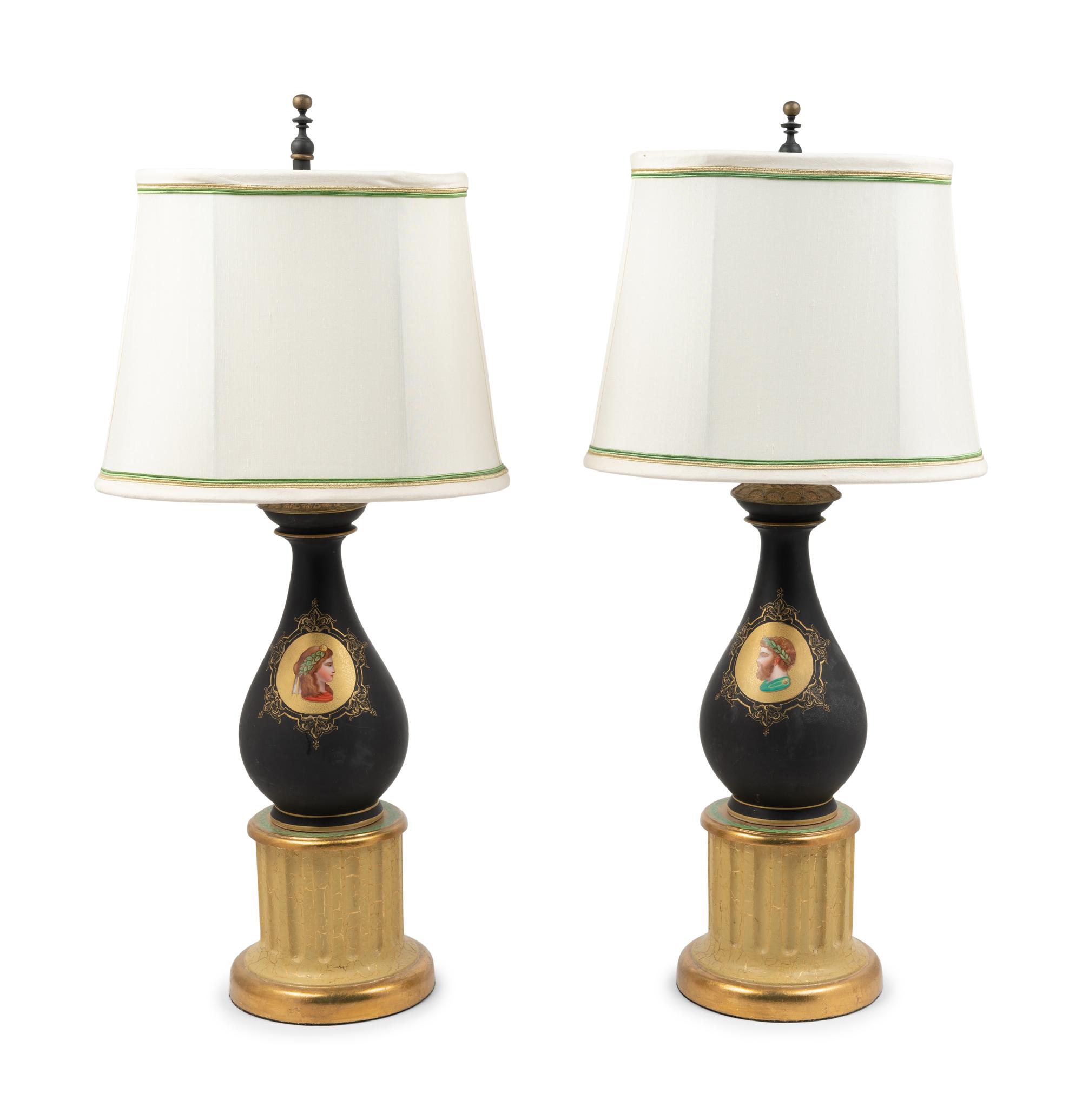 A Pair of Continental Porcelain and Giltwood Lamps