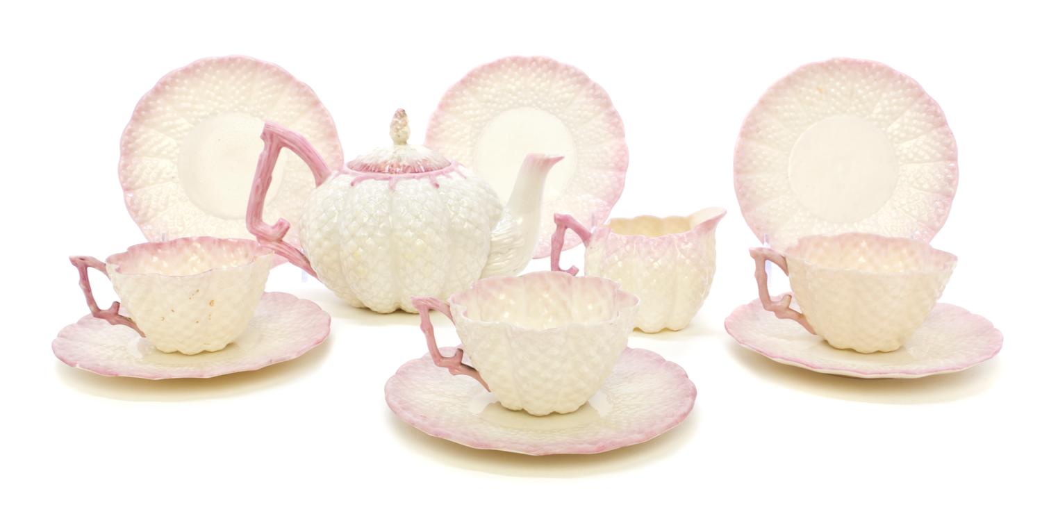 A Partial Belleek Cone Tea Service, Height of teapot 4 1/2 inches.