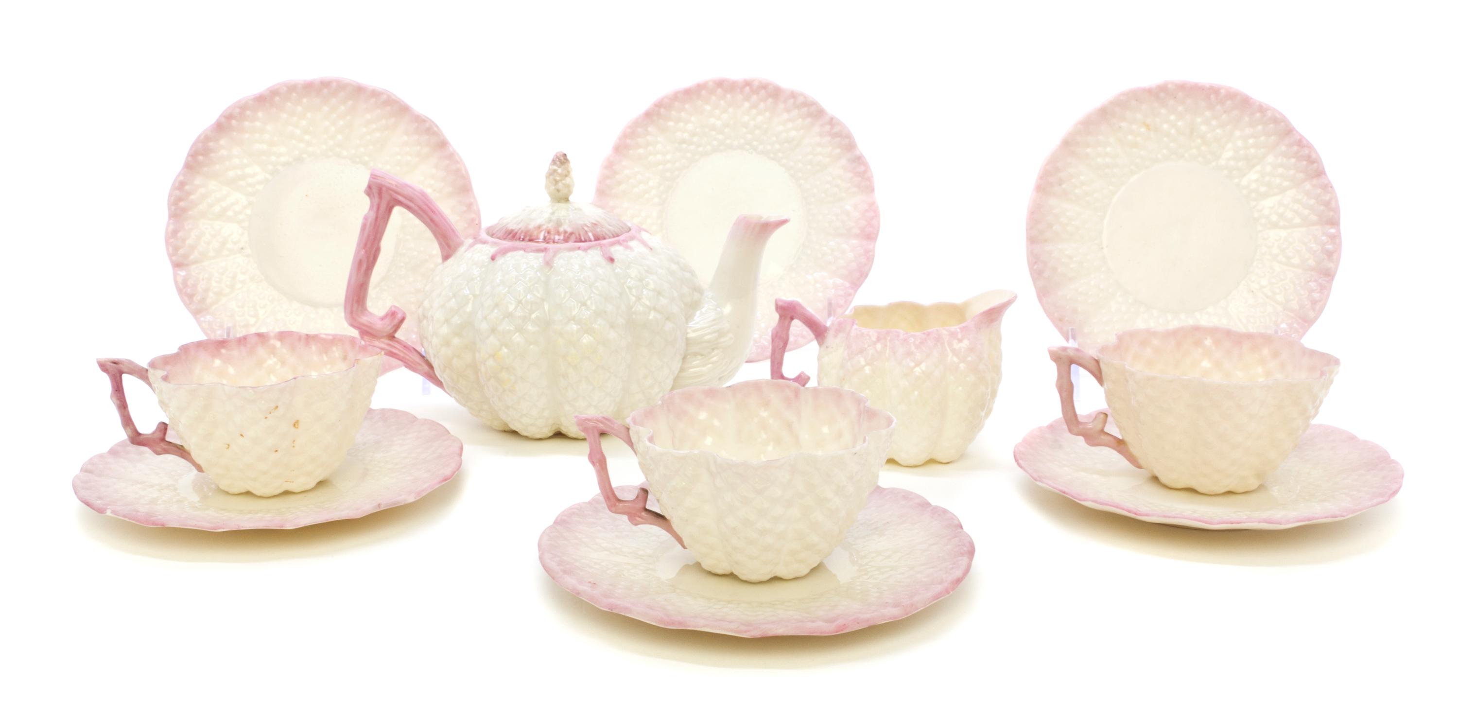 A Partial Belleek Cone Tea Service, Height of teapot 4 1/2 inches.