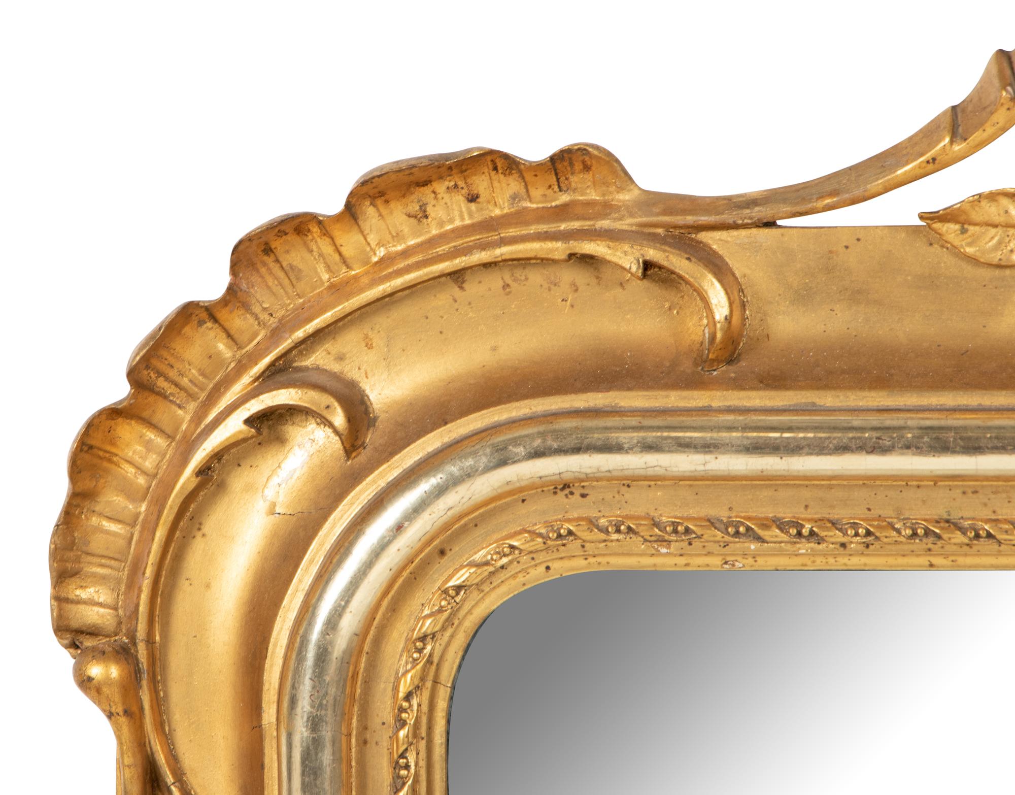 An Italian Part-Silvered Giltwood Mirror
