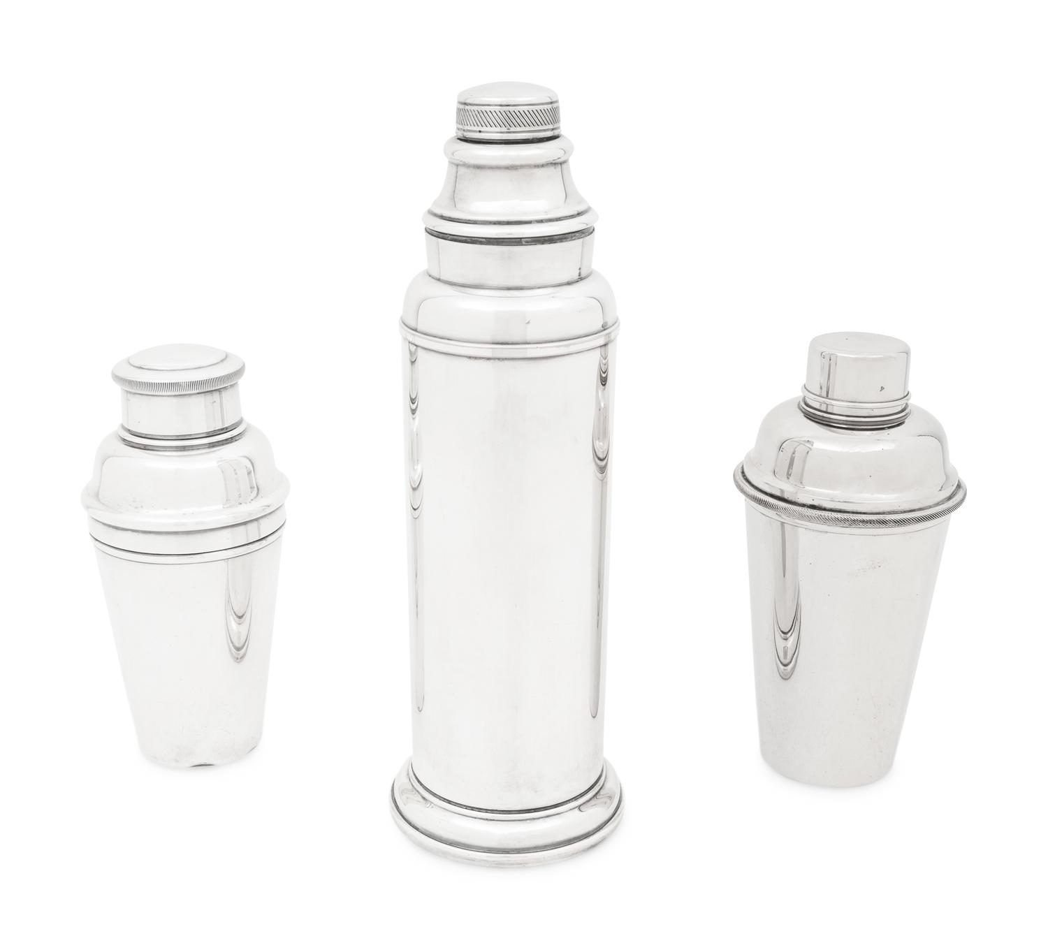A Group of Three Silver-Plate Cocktail Shakers