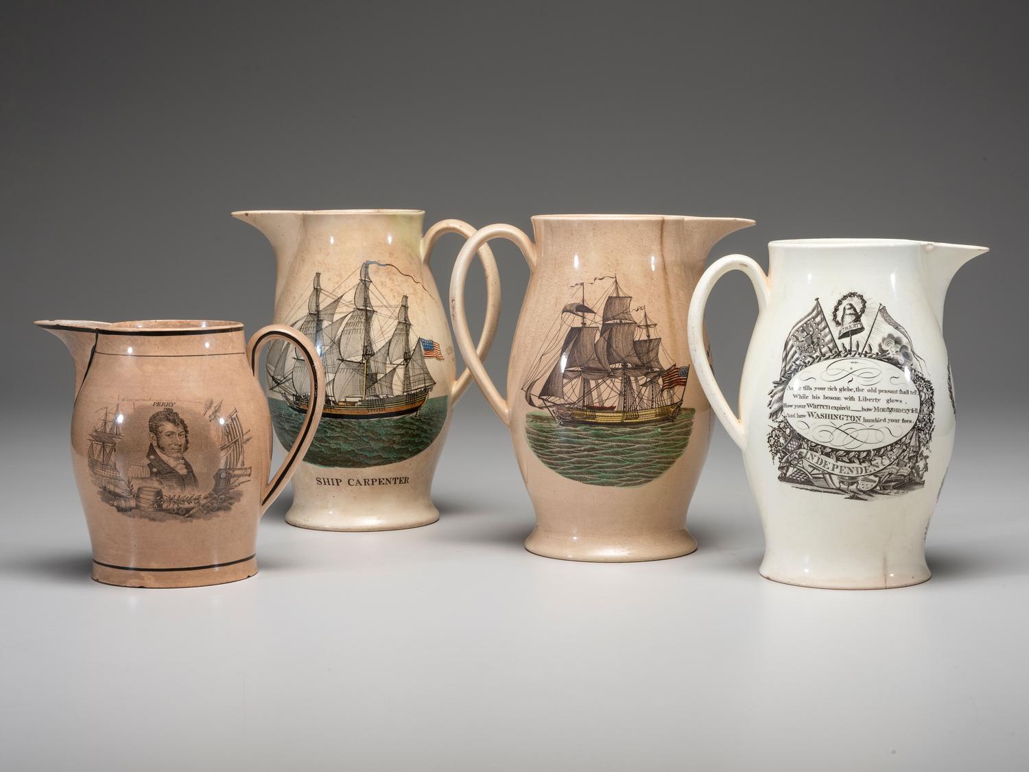 Four Patriotic Creamware Pitchers