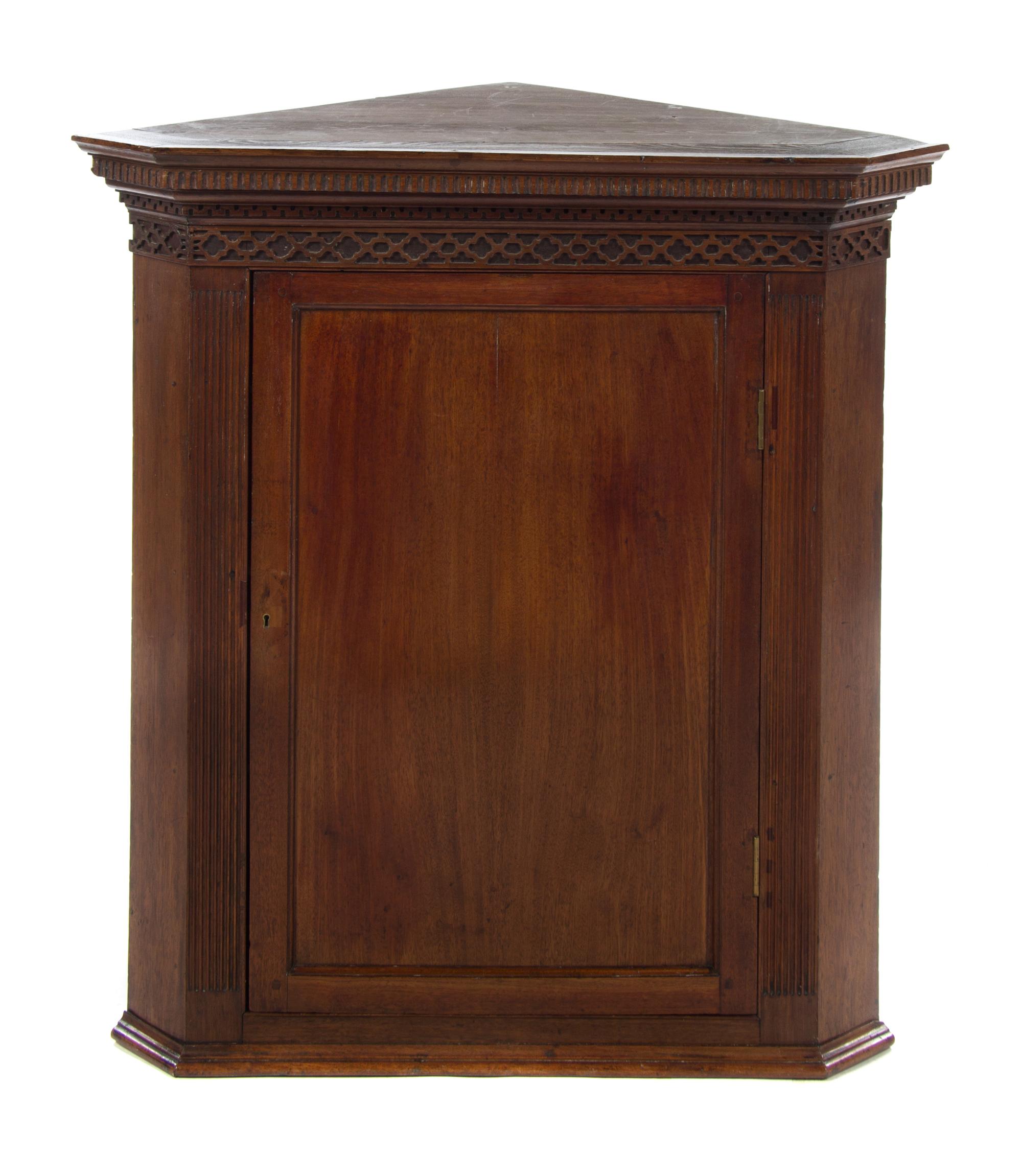 A Chippendale Style Mahogany Hanging Corner Cupboard Height 39 x width 36 1/4 x depth 22 inches. — 19TH CENTURY