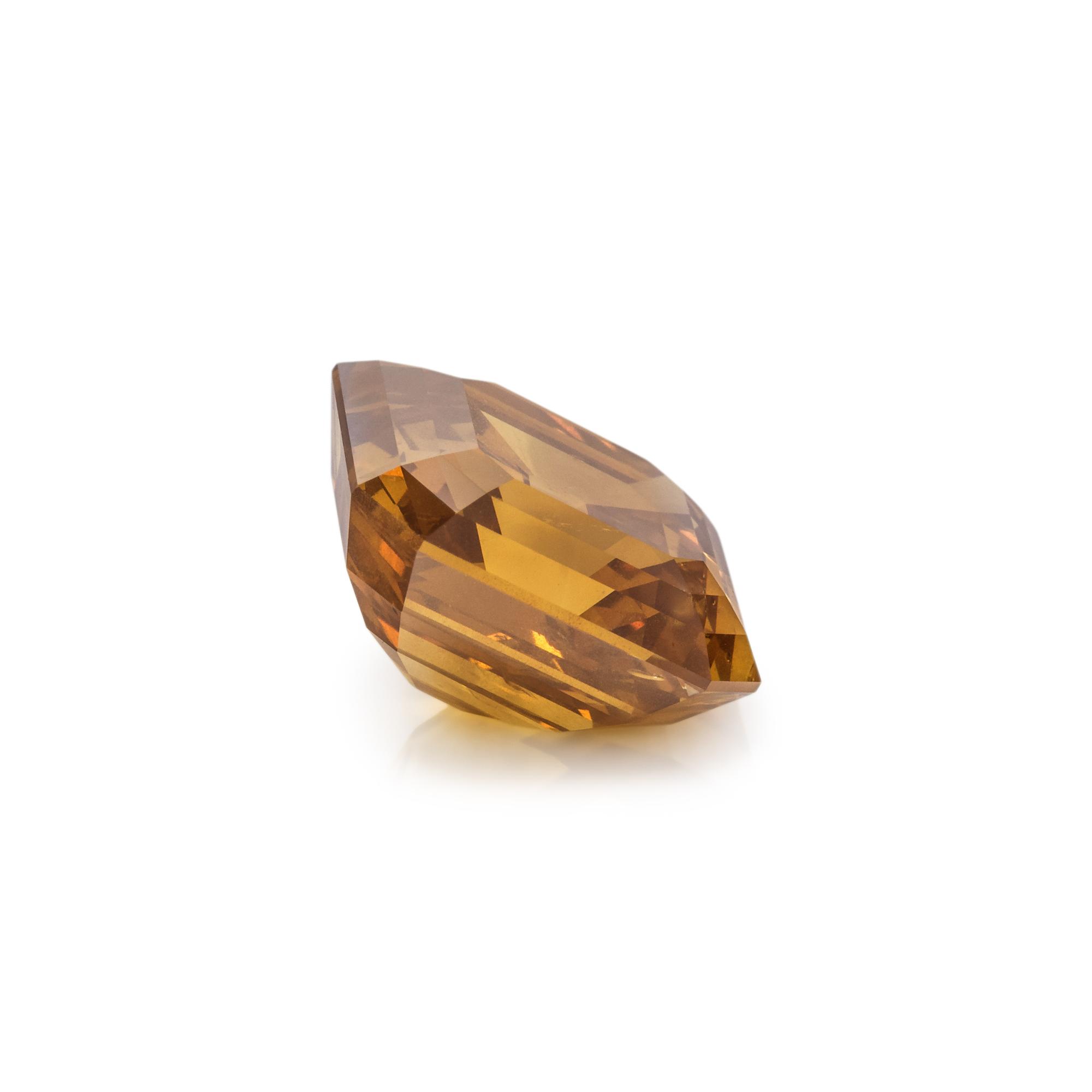 6.67 CARAT EMERALD CUT FANCY DEEP BROWNISH ORANGY YELLOW DIAMOND