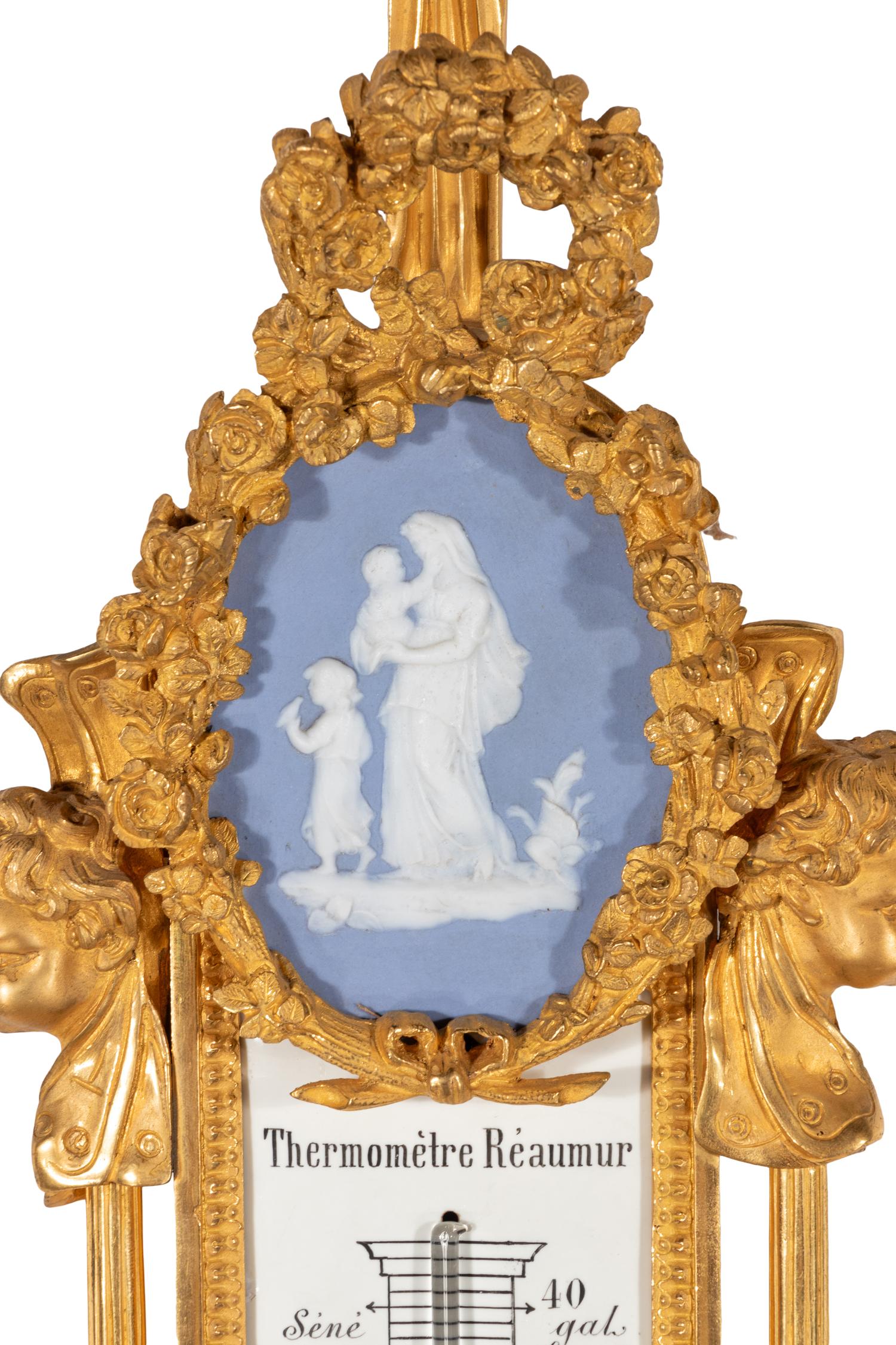 A French Neoclassical Gilt Bronze and Jasperware Cartel Clock and Barometer Set