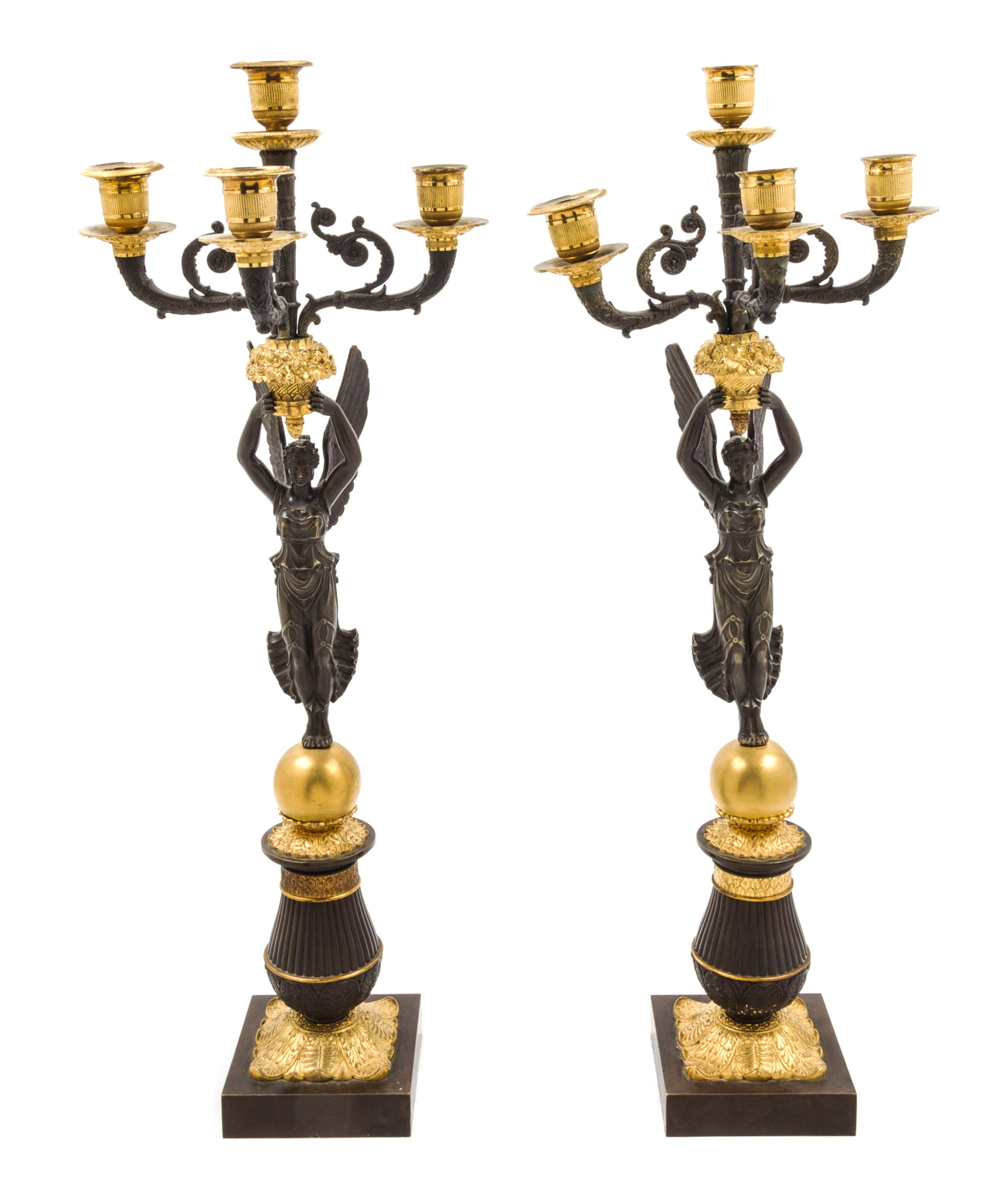 A Pair of Empire Gilt and Patinated Bronze Four-Light Candelabra Height of each 26 1/2 inches. — 19TH CENTURY