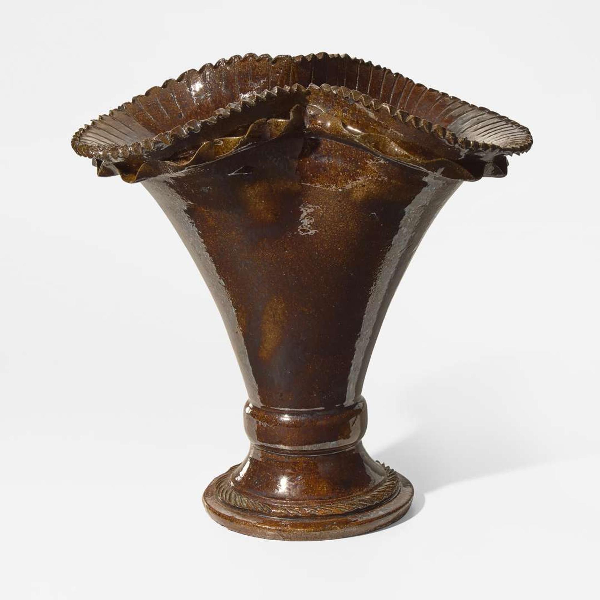 George Ohr (American, 1857-1918) Large Flower Vase with Serrated and Ruffled Rim in Brown Glaze, Biloxi, Mississippi, USA, circa 1895-1896