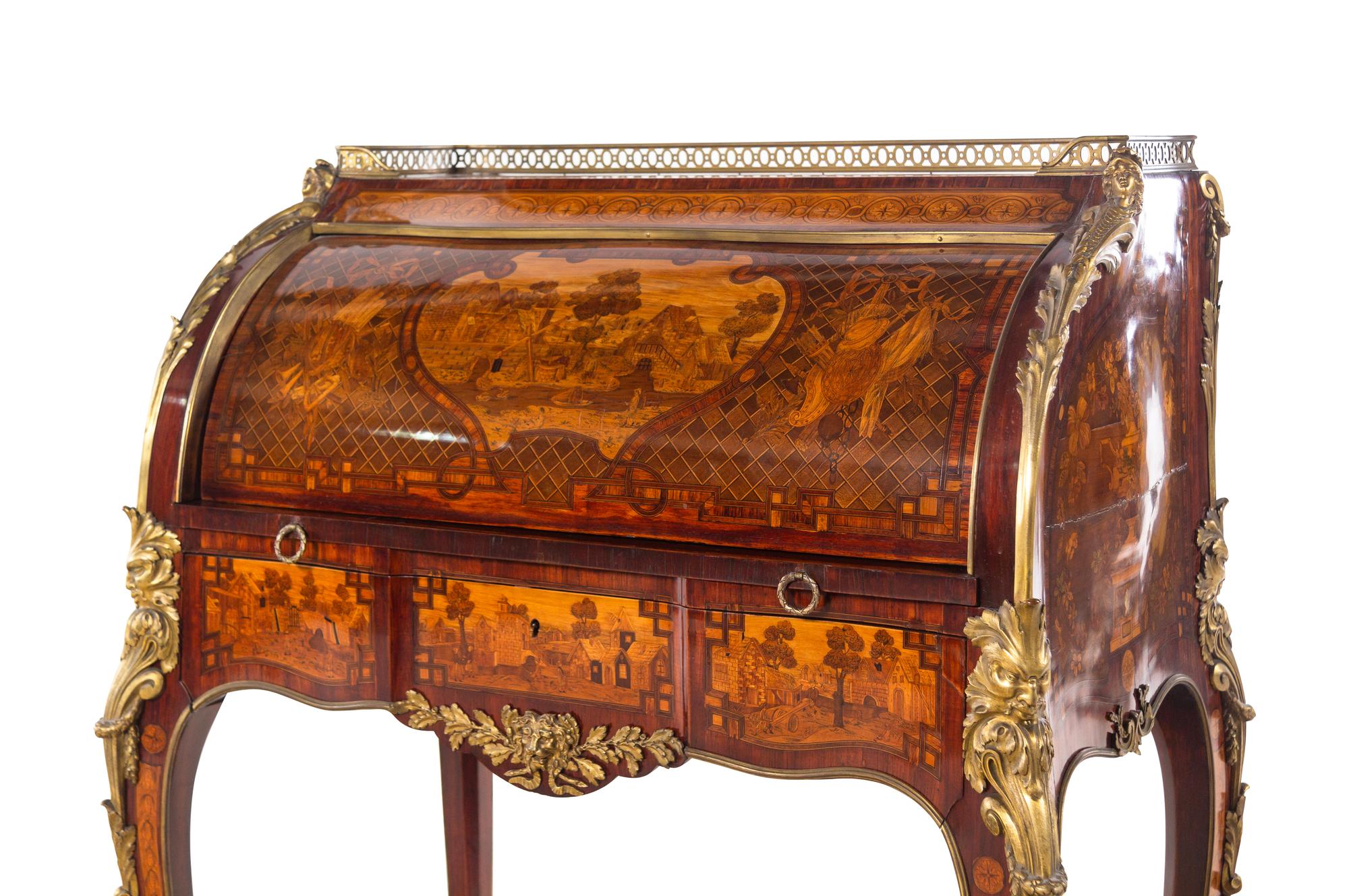 A Louis XV Style Gilt Bronze Mounted Marquetry Cylinder Bureau