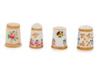Four English Painted and Parcel Gilt Porcelain Thimbles